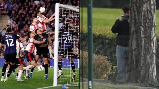 Un espía que graba con el móvil; foto: OkDiario.